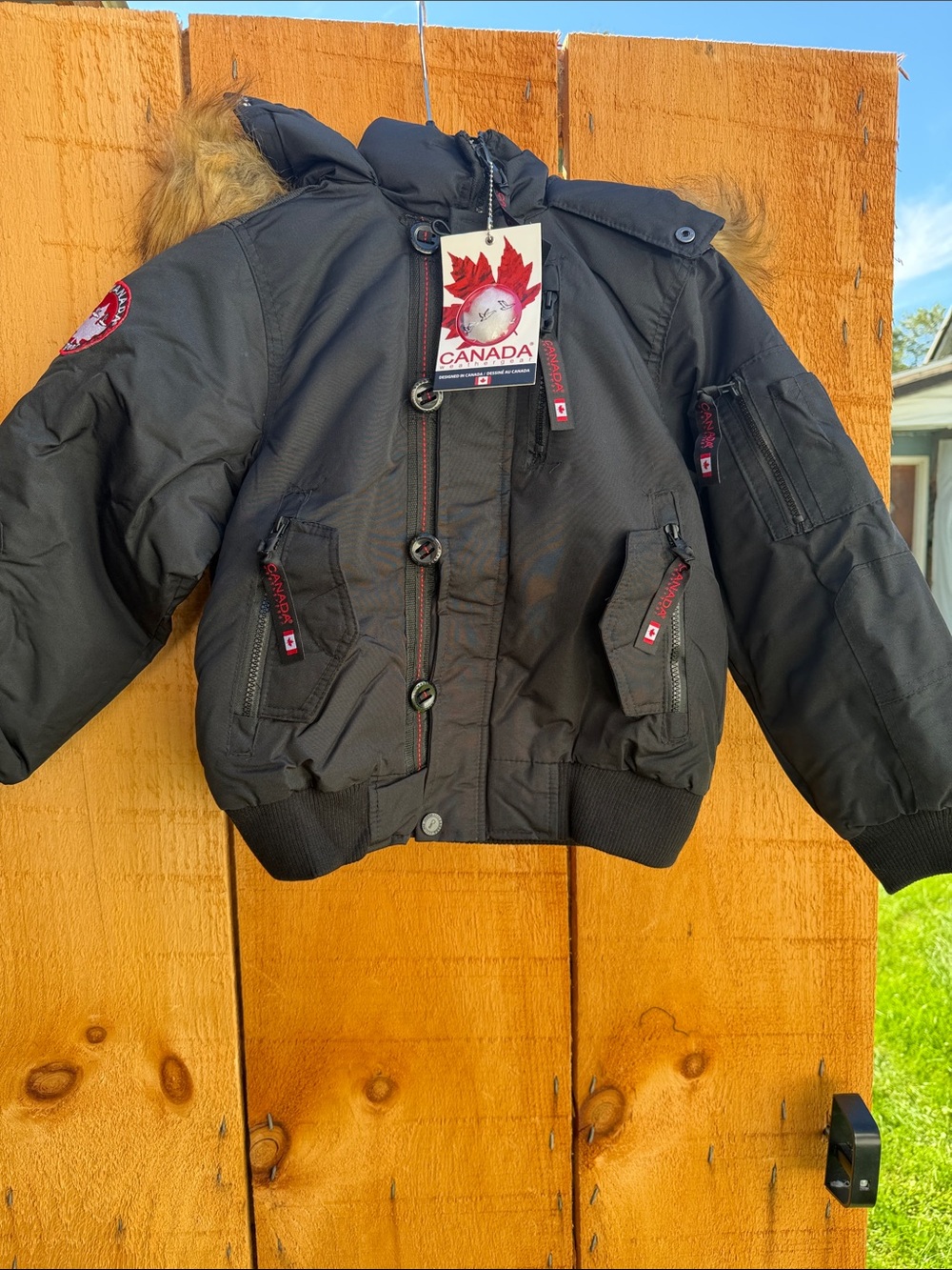 Canada Kids Black Hooded Puffer Jacket with Faux Fur Trim
